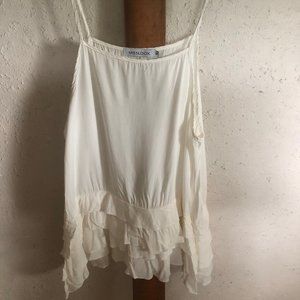 white cami with ruffled bottom